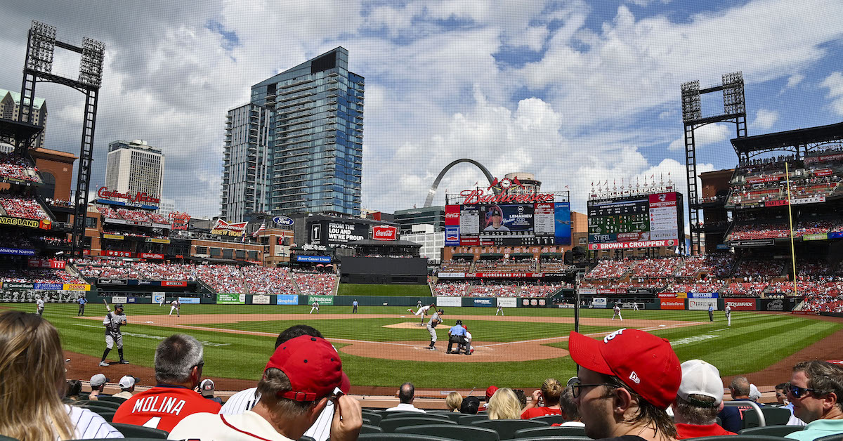 Workers install pitch clocks at Busch Stadium